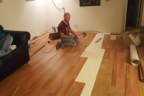 man-working-hardwood-floor-home.jpg